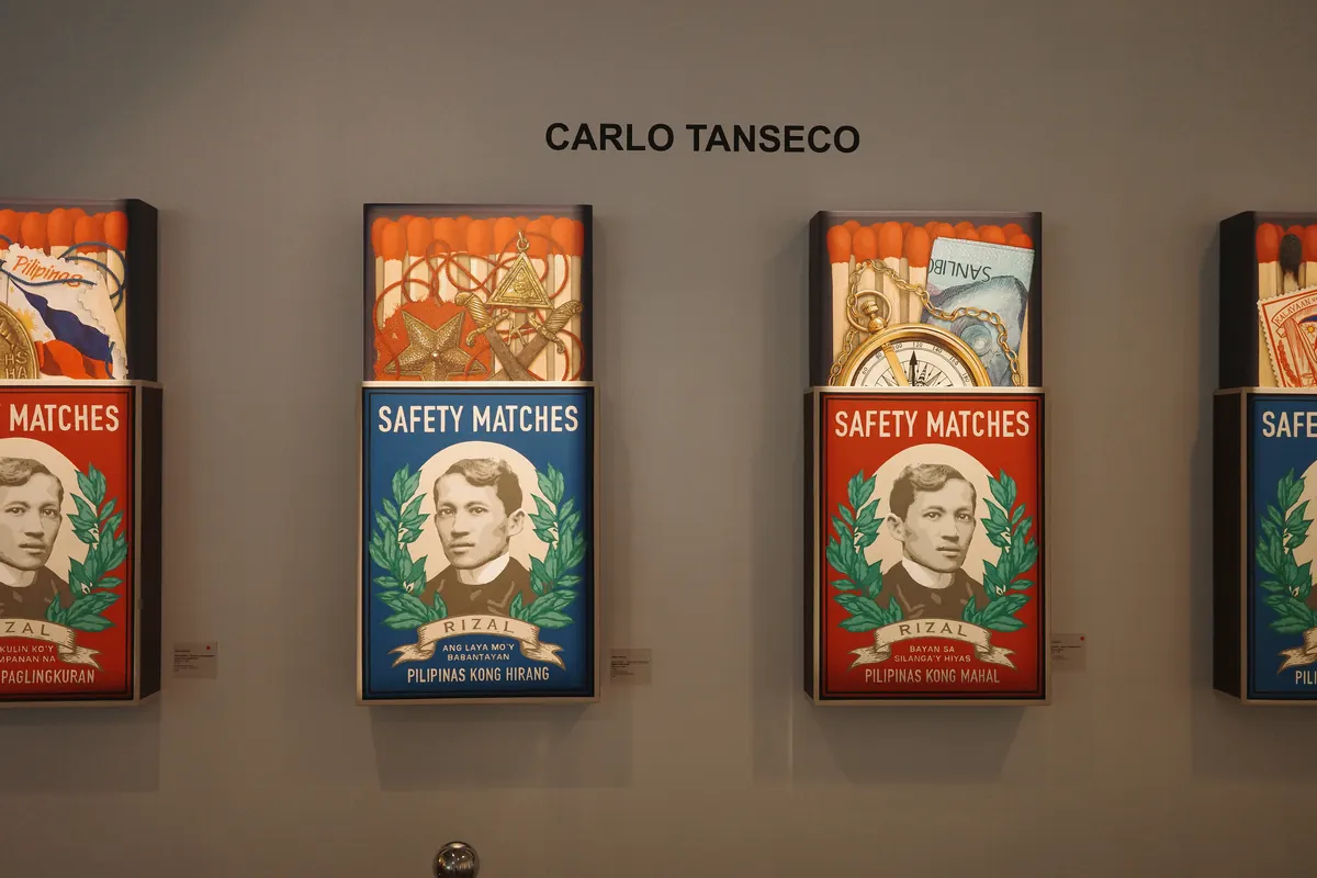 Carlo Tanseco’s Safety Matches paintings in a row on the gallery wall